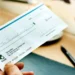 Cambian las reglas para las sociedades de bolsa y buscan evitar una doble retención del impuesto al cheque